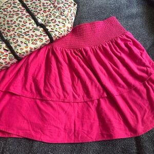 Crown & Ivy Pink Smocked High-Low Midi Skirt. Stretchy and slimming